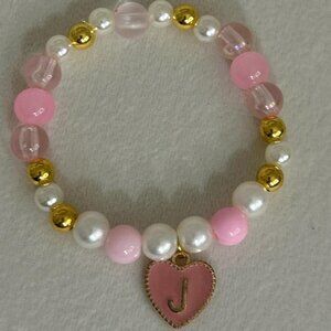 Pink and white beaded bracelet with a heart charm #fairycore #cottagecore